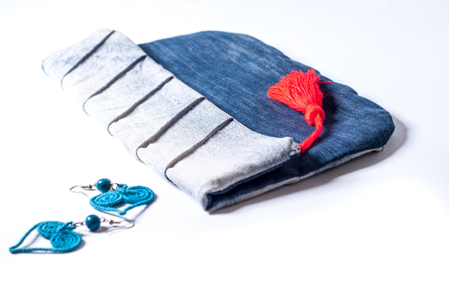 Denim clutch with seam details