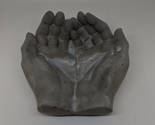Concrete hands catch all