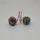 Anillos dobles envueltos en cobre.