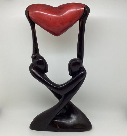 Uplifting Our Love wooden sculpture