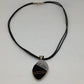 Tuareg ebony small pendant with copper lines necklace