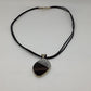 Tuareg ebony small pendant with copper lines necklace