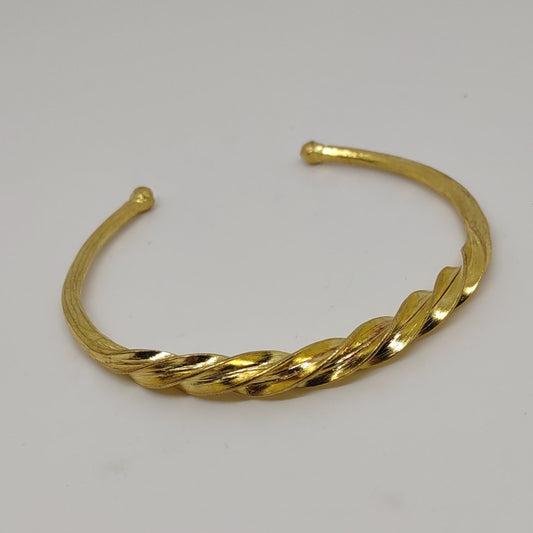 gold plated cuff with twist design